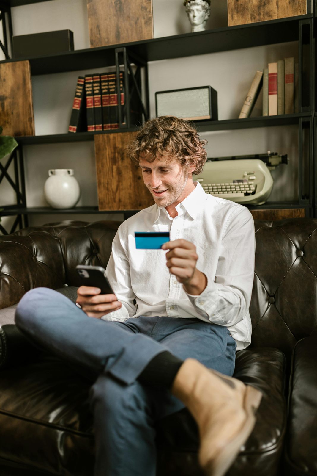 Customer using mobile banking with a bank card